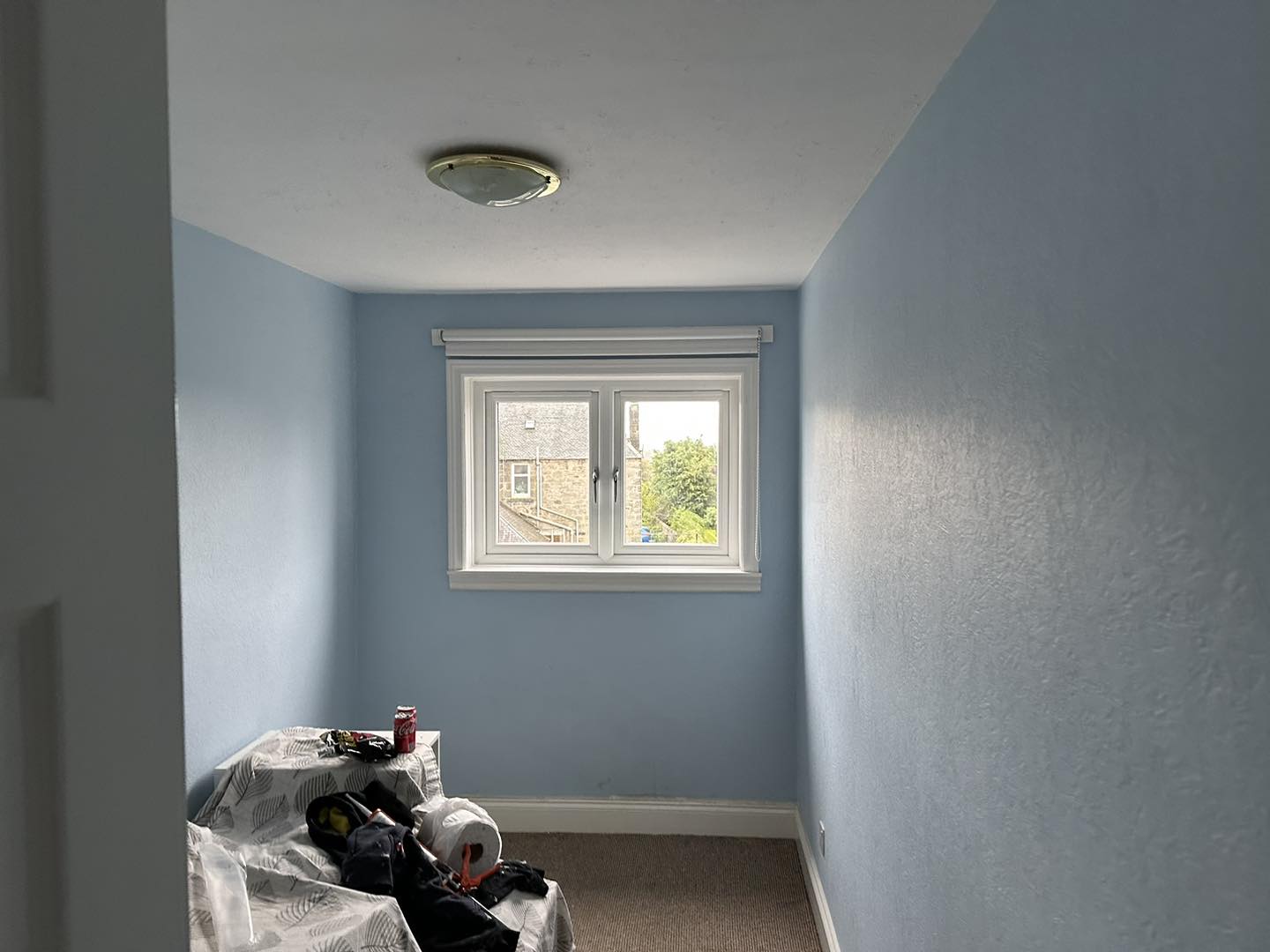 Double Case window looking out to another house