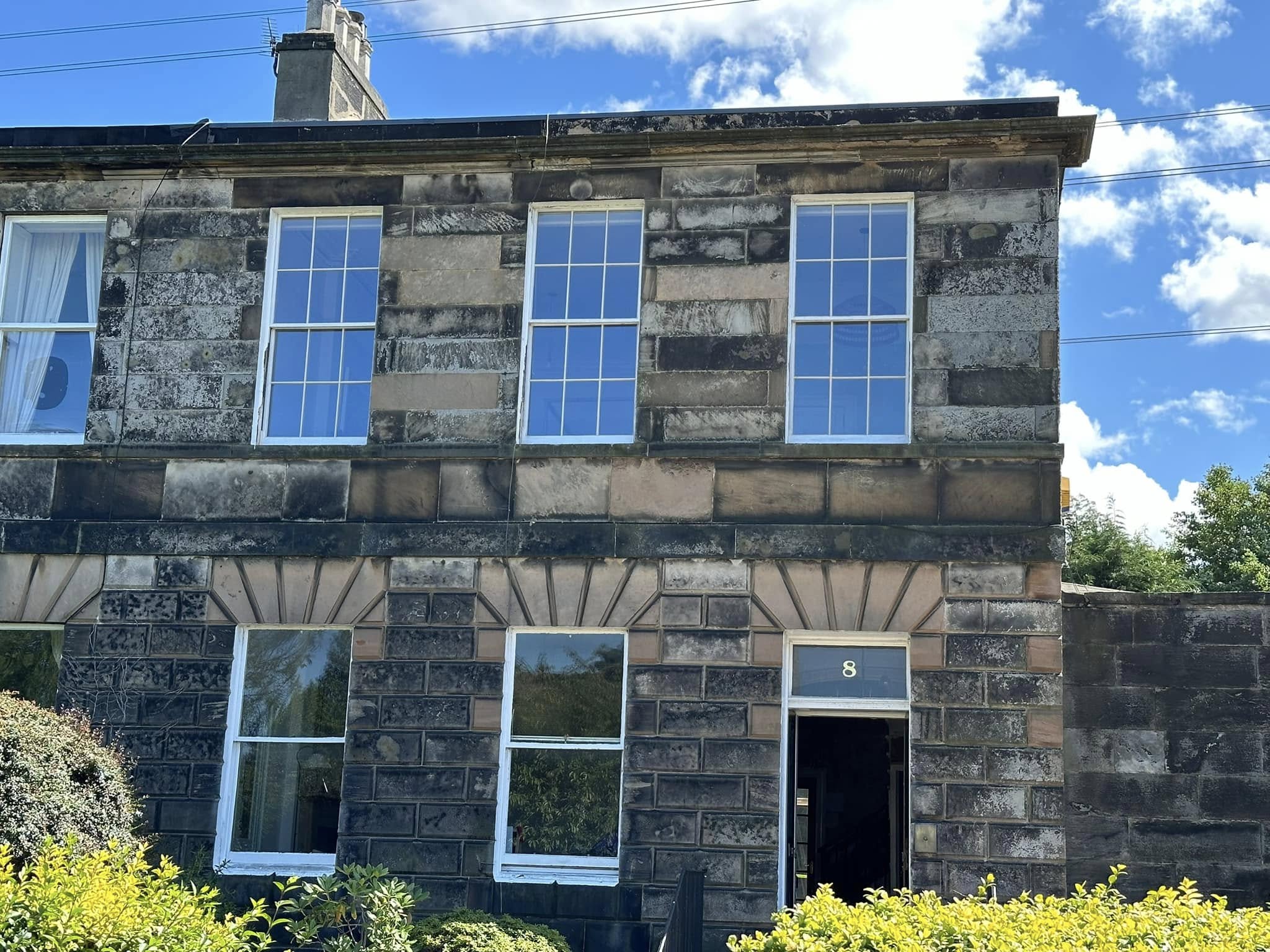 Large rectangle Sash windows on house building